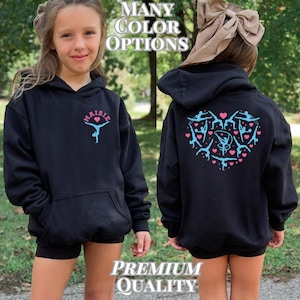 May include: Black hoodie with a front pocket and hood. The front features the name "Maisie" above a gymnast figure in blue. The back displays a heart-shaped design of gymnast figures and hearts. Text on the image reads "MANY COLOR OPTIONS" and "PREMIUM QUALITY".