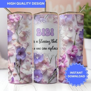 May include: A white tumbler with a floral design in shades of pink and purple. The tumbler has the text "BIBI is a blessing that no one can replace" printed on it.