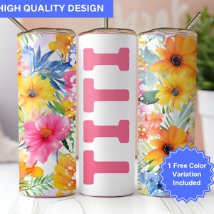 May include: Three stainless steel tumblers with a floral design. The tumbler in the middle has the word "TITT" written in pink letters. The tumblers are on a white surface. 1 Free Color Variation Included.