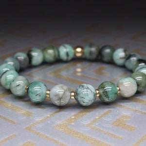 8mm emerald bracelet with 14k carat gold spacers / gemini lucky stone / cancer and Taurus zodiac bracelet