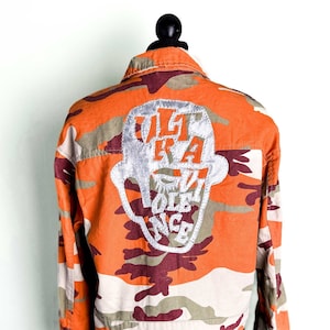A Clockwork Orange Camoflage Jacket with silver leather appliqué and dome studs - Rock, Goth, Punk