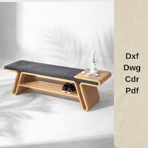 Puede incluir: Banco de madera moderno con asiento acolchado gris oscuro y estante para zapatos incorporado. El banco tiene una mesa auxiliar con un jarrón decorativo. El texto "Dxf, Dwg, Cdr, Pdf" es visible a la derecha.