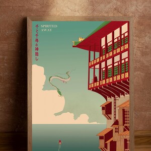 Puede incluir: L&aacute;mina enmarcada con una escena de "El Viaje de Chihiro". La obra muestra un edificio rojo y verde con un drag&oacute;n volando. El texto "Spirited Away" y texto japon&eacute;s son visibles.