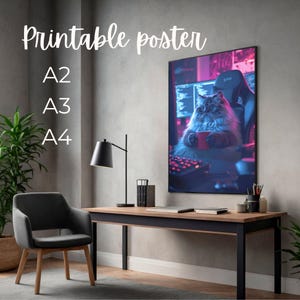 May include: Printable poster showing a fluffy cat with glasses, holding a red mug, and seated in a gaming chair before a computer. Available in A2, A3, and A4 sizes. The text "Printable poster" is written in a cursive font.