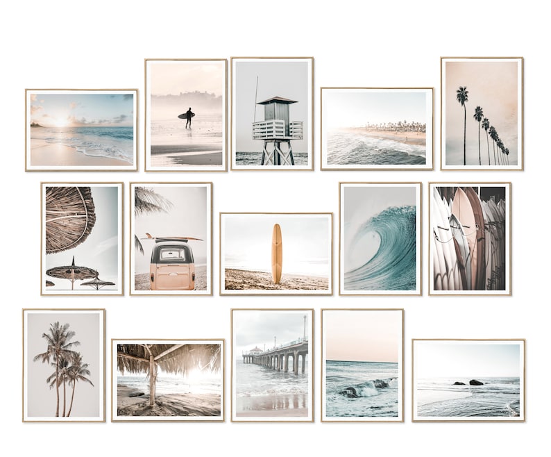 May include: A collection of 15 framed prints featuring beach scenes, including surfers, palm trees, waves, and a lifeguard stand. The prints are all in a similar style, with a light and airy feel.