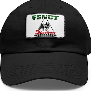 May include: Black baseball cap with a white patch featuring the Fendt logo, a green and white tractor, and the text "Dieselross Schlepper".