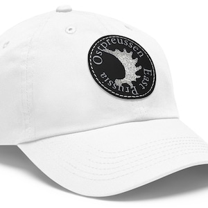May include: White baseball cap with a black and white embroidered patch that says "Ostpreussen East Prussia".