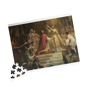 May include: A painting depicting a historical scene with a group of people in medieval clothing. A man in a red and gold robe kneels before a figure in white robes, holding a crown. The scene is set in a grand hall with ornate columns and arches.