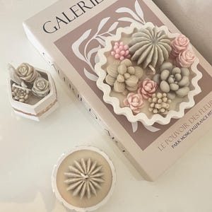 eleganti candele con composizione di piante grasse profumate ideali come bomboniere originali, regali o complimenti d’arredo.