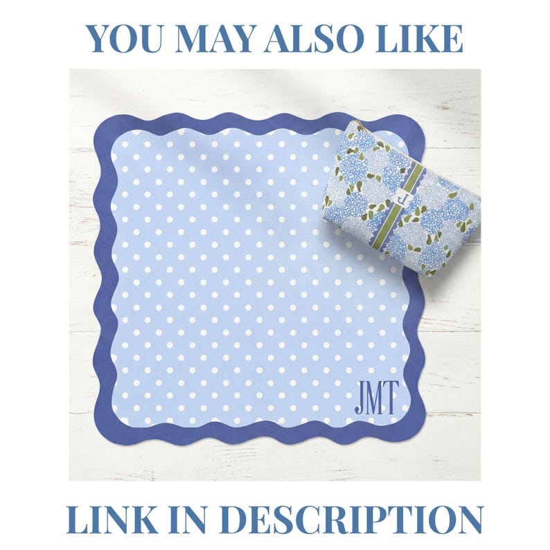 May include: A light blue polka dot notepad with a scalloped edge and the initials "JMT" in the corner. A matching floral print gift is also present. The text "YOU MAY ALSO LIKE" and "LINK IN DESCRIPTION" are displayed.