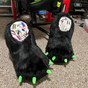 Black and green fursuit feet paws