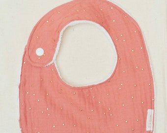 Small bib in cotton gauze and gold polka dots