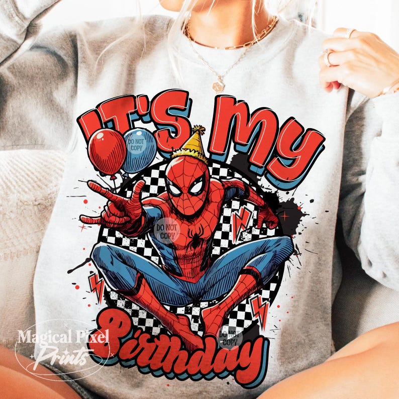 May include: A gray sweatshirt with a red, white, and blue graphic of Spiderman wearing a party hat and the text "It's My Birthday".