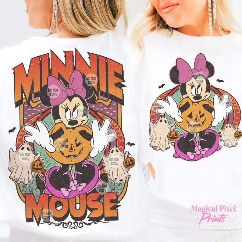 May include: White long-sleeve shirt with a Halloween Minnie Mouse design. The design features Minnie Mouse, a jack-o'-lantern, ghosts, and the words "MINNIE MOUSE" in orange and brown. The shirt has a retro, vintage style.