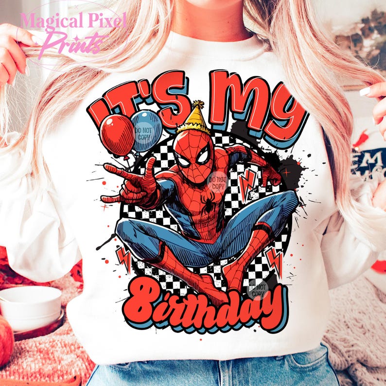 May include: White long-sleeve shirt with a red, blue, and black graphic of Spiderman with the text "It's my Birthday" in red, blue, and white.