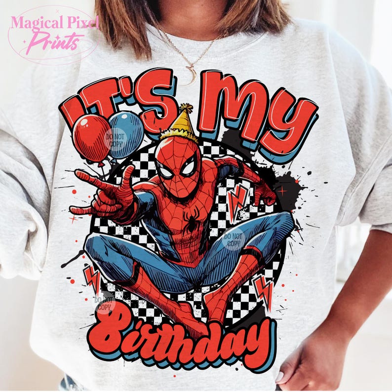 May include: A white sweatshirt with a red, blue, and black graphic of Spiderman. The graphic says "It's my birthday" in a retro font.