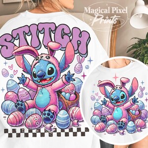 May include: A white t-shirt with a pink and blue cartoon Stitch wearing bunny ears and surrounded by pastel Easter eggs. The text "STITCH" is in purple letters on the shirt.