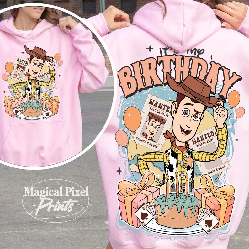 May include: Pink hoodie with a cartoon image of Woody from Toy Story. The image includes a birthday cake, presents, and balloons. The text "It's my Birthday" is printed on the hoodie.