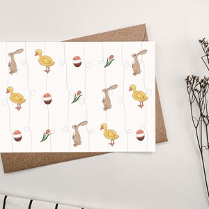 Cartolina di Pasqua con motivo coniglietto, pulcino e tulipano