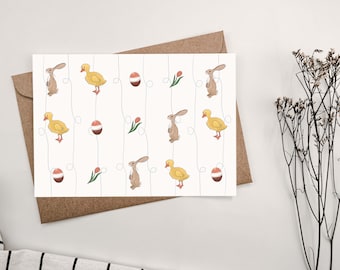 Tarjeta postal de Pascua con diseño de conejito, pollito y tulipán