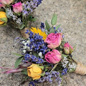 Our bouquets are perfect for presents and gifts, bouquets for the home, but also they are very popular for weddings.         Here is a matching buttonhole. As always we can adapt our buttonholes and bouquets to match your wishes.