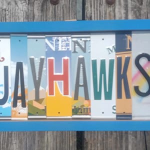 KU Jayhawks sign made with license plate letters on a 12&quot;x8&quot; wood frame dorm wall art gift decor for University of Kansas student or alum