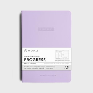 May include: A lavender-coloured 90-day journal with the title "PROGRESS" and the text "TIME BLOCK EDITION" on the cover. The journal is A5 size and has a soft cover.