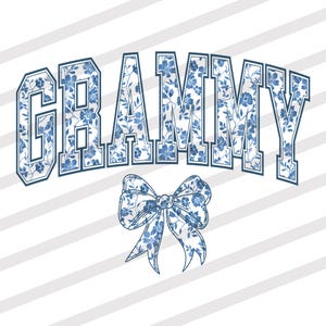 May include: A graphic design featuring the word "GRAMMY" in a bold, arched font, filled with a blue floral pattern. Below the text is a matching blue floral bow. The background has diagonal white and light gray stripes.