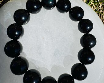 Powerful. Rainbow black Obsidian. 14mm. Large