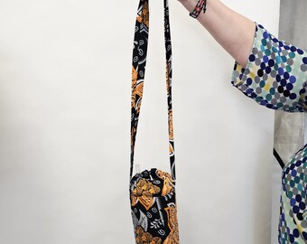 Porte-gobelet/sac Stanley orange et noir, fabriqué au Kenya pour une association caritative (3C)