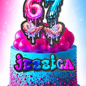 May include: A colourful birthday cake with blue icing, pink and purple sprinkles, and a topper displaying the number "67" in dripping, glittery letters. The name "Jessica" is also on the cake in a graffiti-style font, ideal for a celebration.