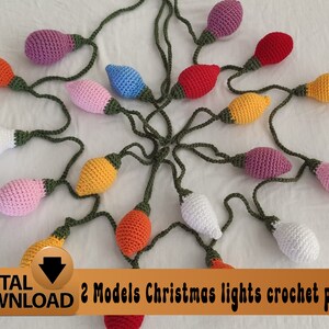 May include: A crochet pattern for making a string of Christmas lights. The lights are in various colors, including white, pink, orange, yellow, and blue. The pattern includes two different models for the lights. The text "DIGITAL DOWNLOAD 2 Models Christmas lights crochet pattern" is at the bottom of the image.