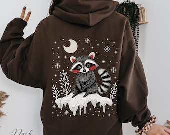 Snow Raccoon Christmas Hoodie, Yule Raccoon Hoodie, Cottagecore Winter Hoodie, Boho Animal Christmas Sweatshirt, Xmas Raccoon Gifts