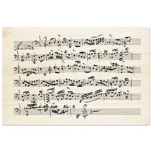 May include: A vintage sheet music print with handwritten musical notes and the word "Sarabande" at the top. The music is printed on a light brown background.