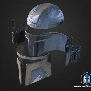 May include: A disassembled blue and gray helmet with white star-shaped accents. The helmet is composed of several parts, including a top piece, face guard, and side components. The design suggests a futuristic or science fiction theme.