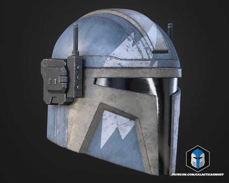 May include: A detailed, weathered Mandalorian helmet in shades of blue and gray. The helmet features a visor, antenna, and a side-mounted device. White geometric patterns adorn the top and front, with a logo on the lower right.