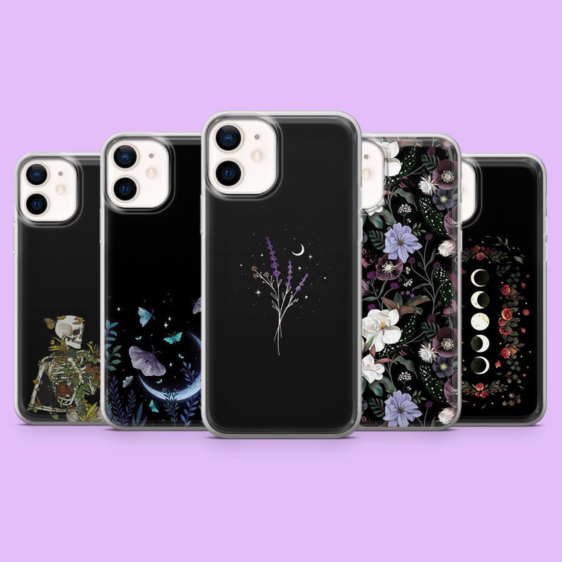 May include: A collection of black phone cases with various designs. One case features a skeleton with floral accents, another showcases butterflies and a crescent moon, and a third displays lavender and a crescent moon. The remaining cases have floral and moon phase designs.