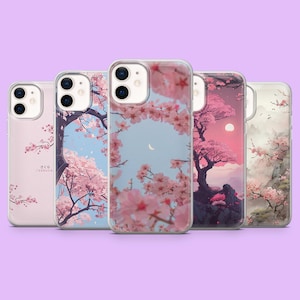 Può includere: Cinque custodie per telefono con disegni floreali. Le custodie presentano immagini di fiori di ciliegio, alberi e paesaggi nei toni del rosa, bianco e blu. Le custodie sono disposte in fila su uno sfondo viola.