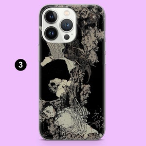 May include: A phone case with a detailed black and white illustration. The artwork shows a complex, surreal composition with figures and abstract elements. The case has a clear border and the number "3" is visible.