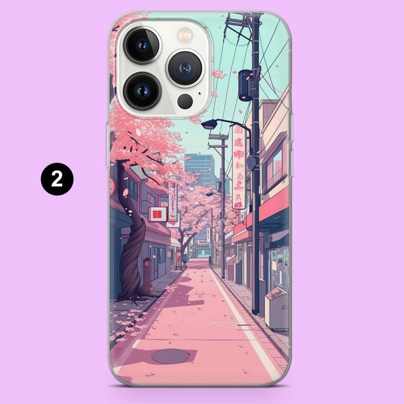 May include: A phone case featuring an anime-style illustration of a street scene in Japan. The design showcases a pink-toned street lined with buildings, cherry blossom trees, and utility poles. The case has a clear border and a camera cutout.