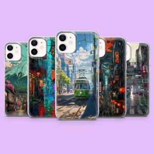 May include: Five phone cases displaying Japanese city scenes. Each case has a different design, including a green tram, a mountain, and busy streets with neon signs. The cases are set against a purple backdrop.
