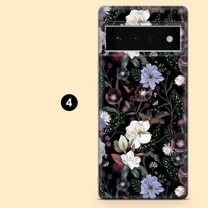May include: A phone case with a floral design. The case features a black background with white, purple, and blue flowers. The design includes various leaves and stems, creating a botanical pattern. The number "4" is in a black circle.