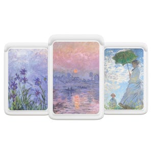 May include: Three white phone cases displaying impressionist art. The cases feature paintings of irises, a sunset over water, and a woman with a parasol. The art is in shades of blue, purple, pink, and green.