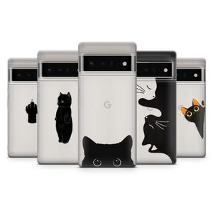May include: A collection of clear phone cases with various black cat designs. One case features a black cat with a raised middle finger, another a standing cat, and others with cat faces and silhouettes.