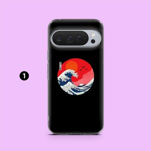 May include: Black phone case with a Japanese wave design. The design features a red sun, white waves, and birds. The case is made of a clear, protective material.