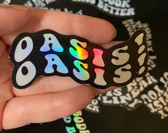 Holographic Unus Annus Quote Sticker "OASIS!"