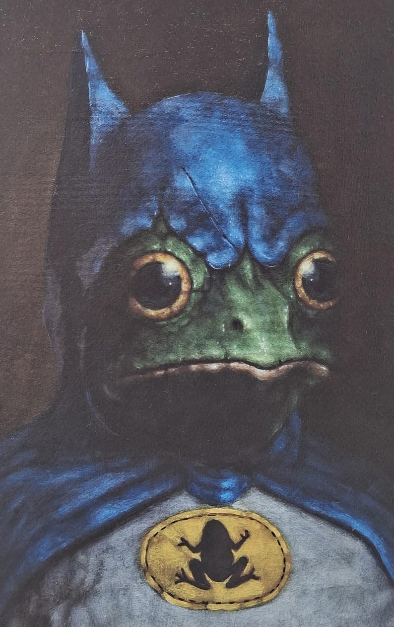 May include: A painting of a frog wearing a blue Batman cowl and cape. The frog's face is green with large, round eyes. A yellow emblem with a frog silhouette is on the chest.
