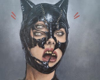 May include: An oil painting on canvas depicting a figure wearing a distressed black cat-ear mask with visible stitching. The figure has multiple eyes, gold teeth, and red slash marks on either side of the head against a solid gray background.