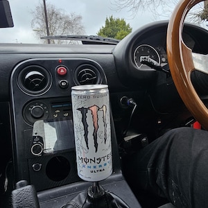 May include: A handmade wooden serving tray with a natural finish. The tray has a rectangular shape, raised edges, and integrated handles. The wood grain is visible, giving it a rustic charm. Dimensions are approx. 45 cm long and 30 cm wide.