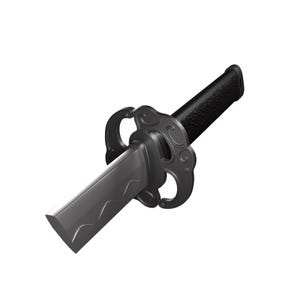 May include: A miniature katana with a black handle and a gray blade. The sword features a decorative guard with a floral design. The handle has a textured grip for a secure hold. The blade has a curved edge.